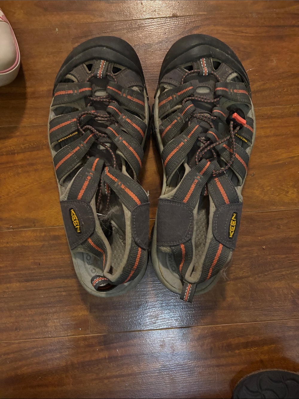 Keen womanās grey Sandal with Orange Trim